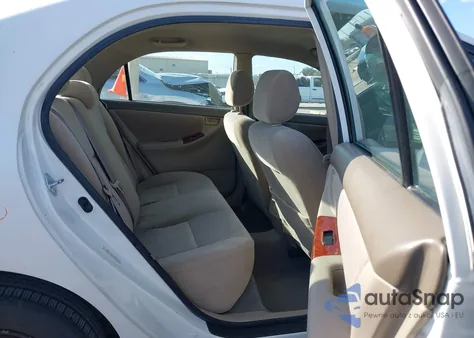 2005 Toyota Corolla Le z USA, uszkodzony, nr VIN JTDBR32EX52059142